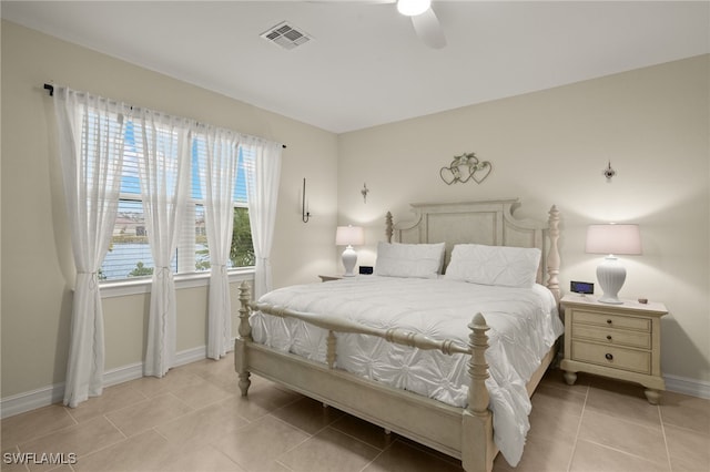 bedroom featuring ceiling fan and light tile patterned flooring