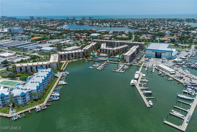 birds eye view of property featuring a water view