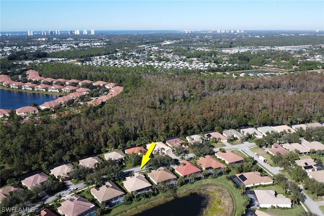 bird's eye view with a water view