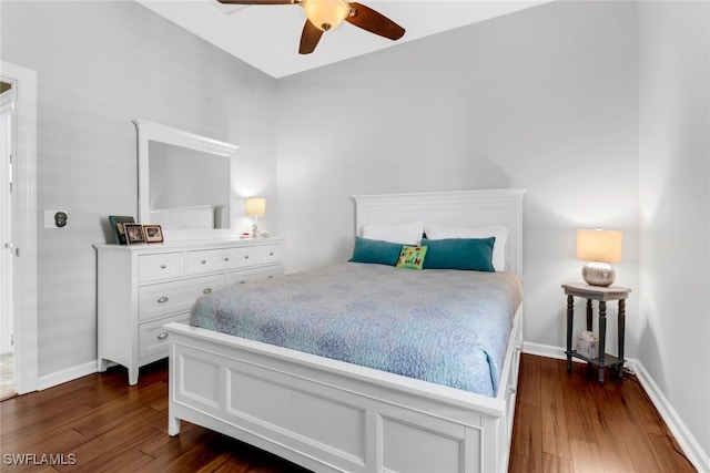 bedroom featuring ceiling fan and dark hardwood / wood-style flooring