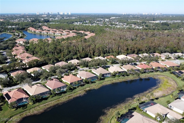 bird's eye view with a water view