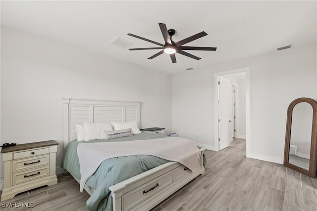 bedroom featuring ceiling fan and light wood-type flooring