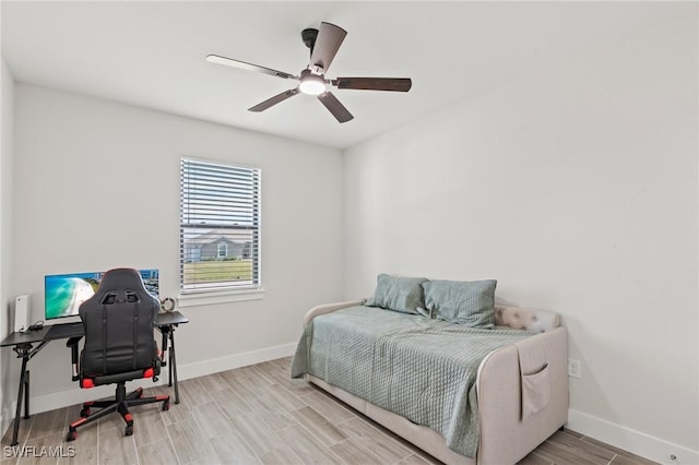 bedroom featuring ceiling fan and light wood-type flooring