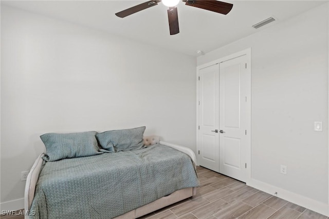 bedroom featuring a closet and ceiling fan