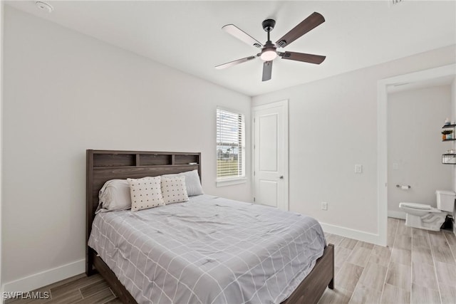 bedroom with ceiling fan and hardwood / wood-style floors