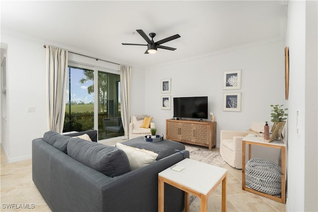 living room with ceiling fan, light tile patterned flooring, and ornamental molding