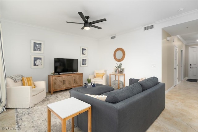 living room featuring ceiling fan, light tile patterned floors, and crown molding