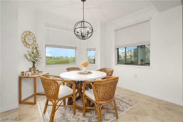 dining space featuring an inviting chandelier, light tile patterned floors, and ornamental molding