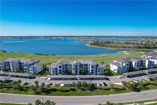 birds eye view of property featuring a water view