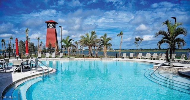 view of swimming pool with a patio area