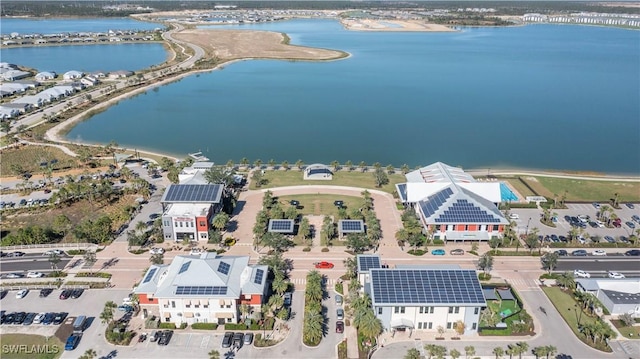 drone / aerial view with a water view