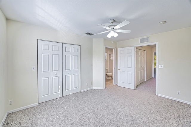 unfurnished bedroom featuring carpet flooring, visible vents, and baseboards