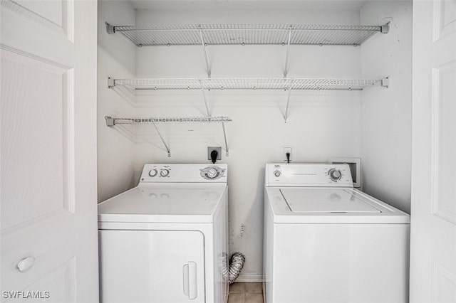 laundry area featuring laundry area and independent washer and dryer