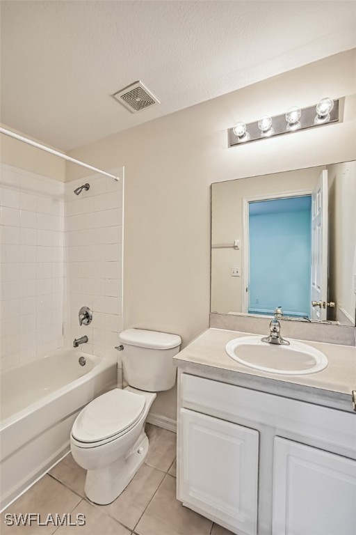 full bath with toilet, tile patterned flooring, visible vents, and vanity