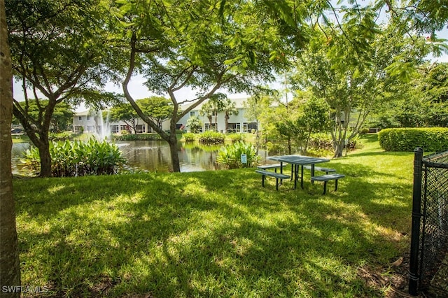 view of yard with a water view