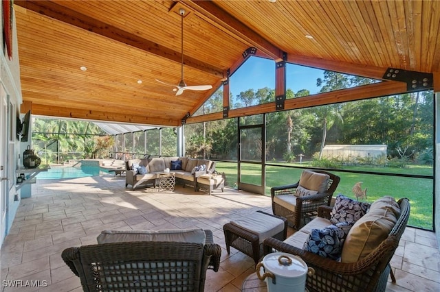 view of patio / terrace with a gazebo, ceiling fan, an outdoor living space, and glass enclosure