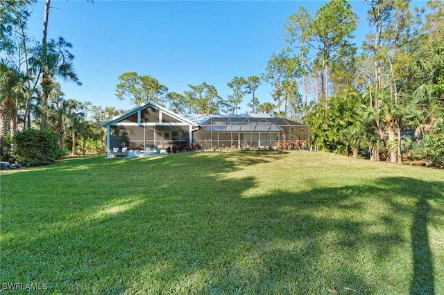 view of yard with a lanai