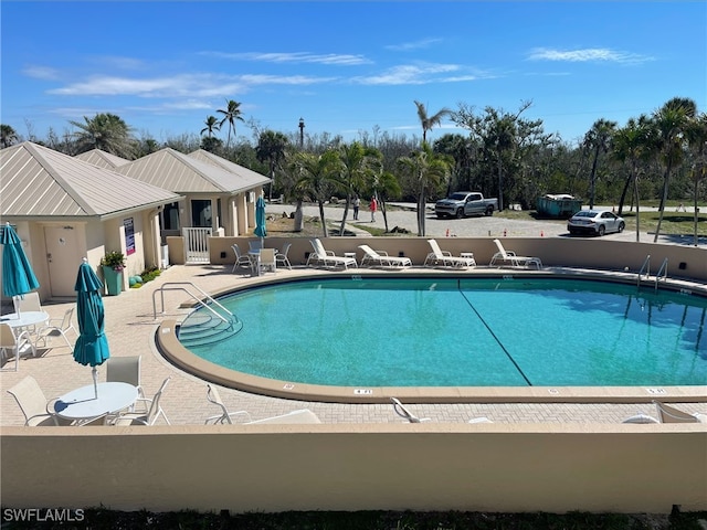 pool featuring a patio