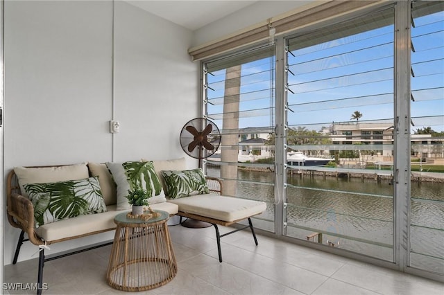 sunroom with a water view