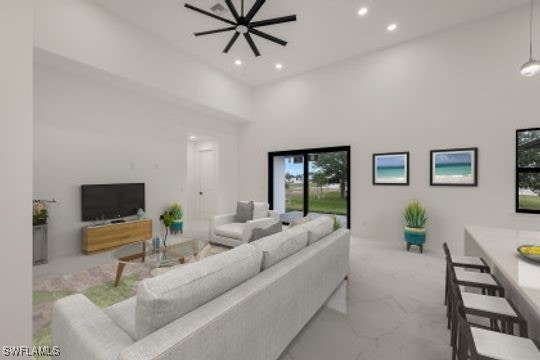 living room featuring a high ceiling