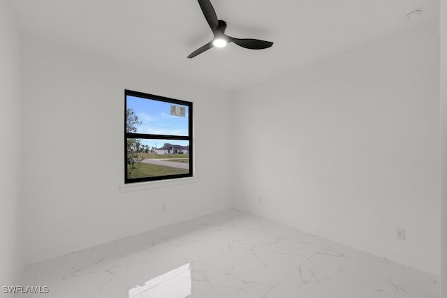 empty room featuring ceiling fan