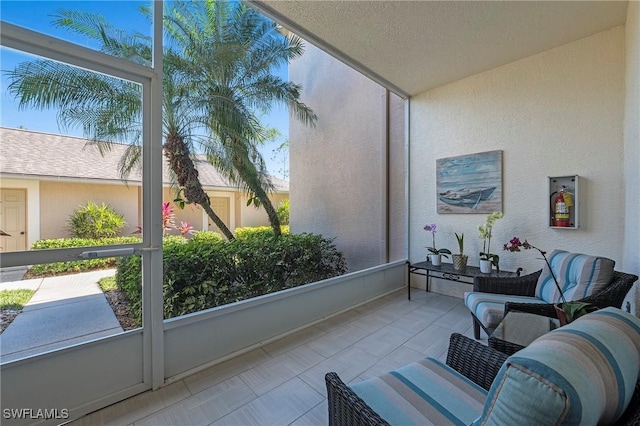 sunroom featuring a wealth of natural light