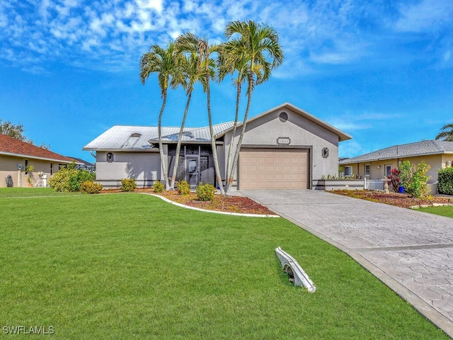 1011 SW 4th Ave, Cape Coral, FL 33991 - single story home with a front lawn and a garage