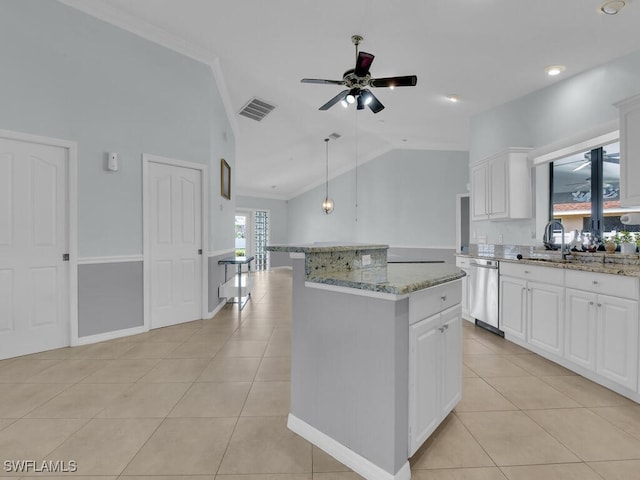 kitchen featuring pendant lighting, dishwasher, a kitchen island, white cabinetry, and light tile patterned floors