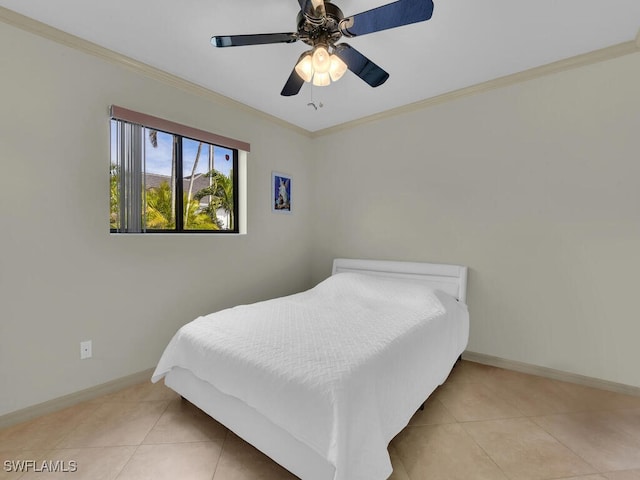 tiled bedroom with ceiling fan and ornamental molding