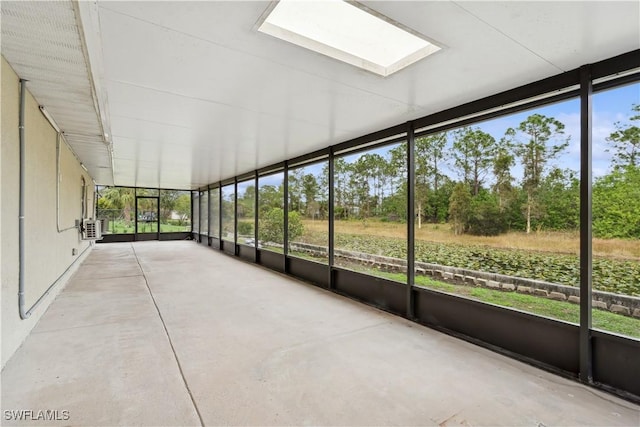 unfurnished sunroom with plenty of natural light