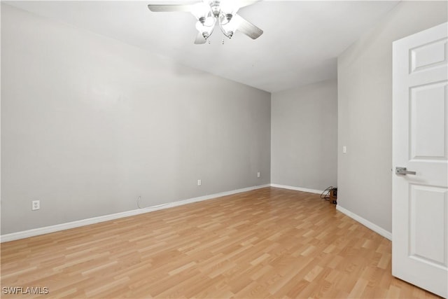 spare room with ceiling fan and light hardwood / wood-style flooring