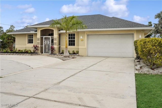 ranch-style house featuring a garage