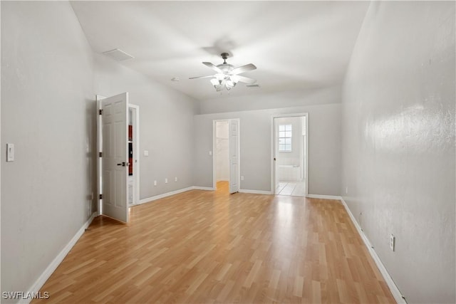 unfurnished room with ceiling fan and light hardwood / wood-style flooring