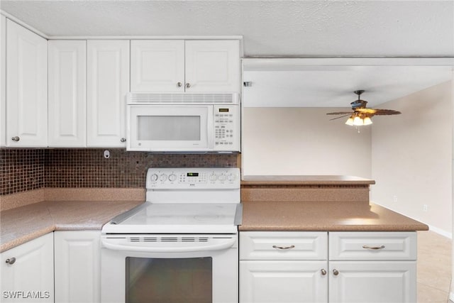 kitchen featuring ceiling fan, white appliances, decorative backsplash, and white cabinets