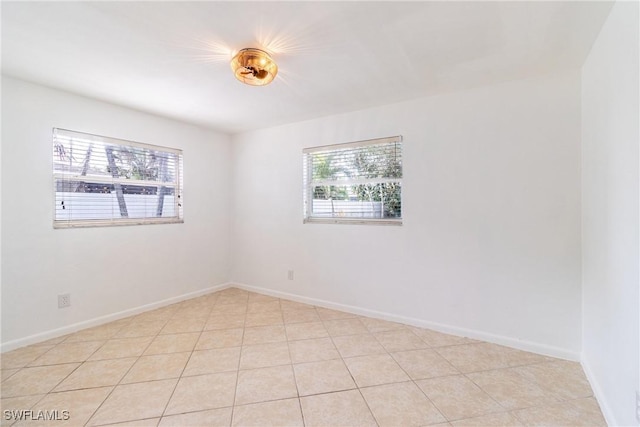 empty room featuring light tile patterned floors