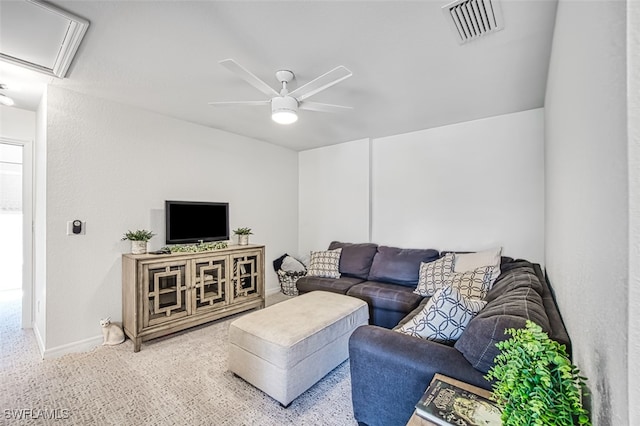 living room with carpet floors and ceiling fan