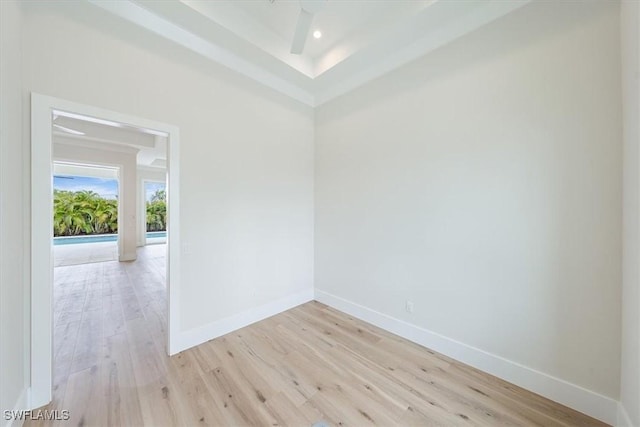 spare room with light wood-type flooring