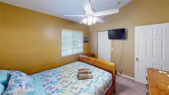 carpeted bedroom featuring ceiling fan