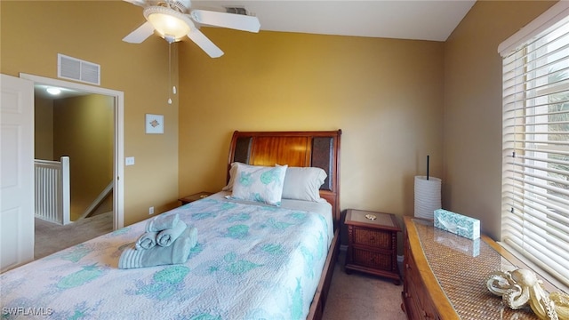 carpeted bedroom with ceiling fan