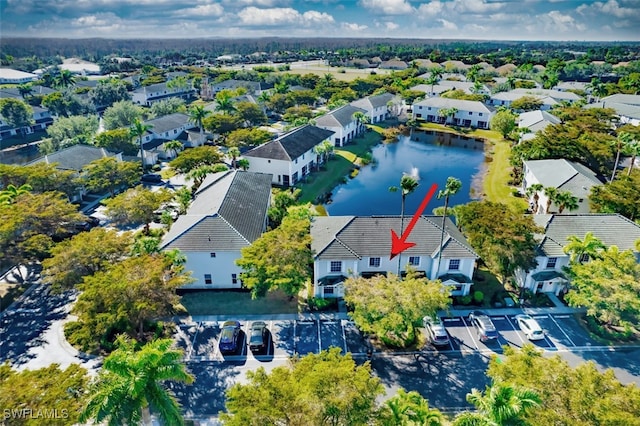 aerial view featuring a water view and a residential view