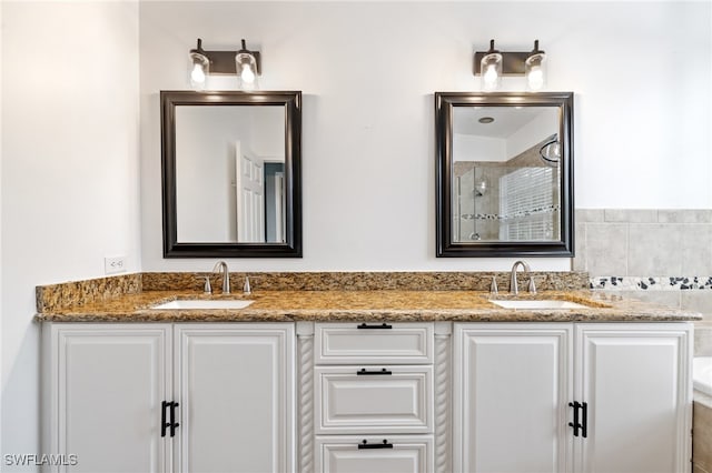 bathroom with vanity and a bathtub