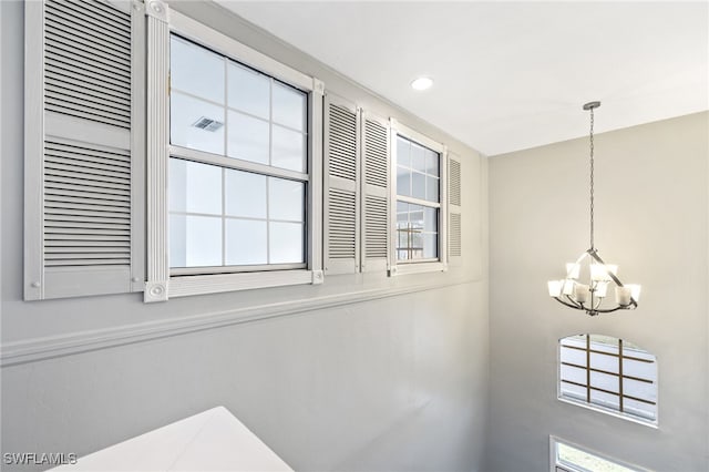 interior space with a notable chandelier