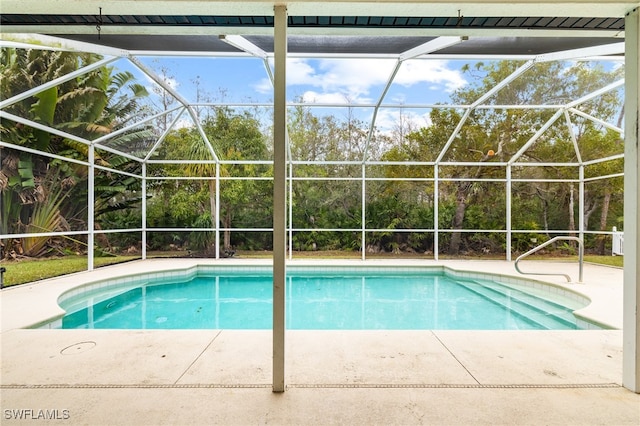 view of pool featuring a lanai and a patio area