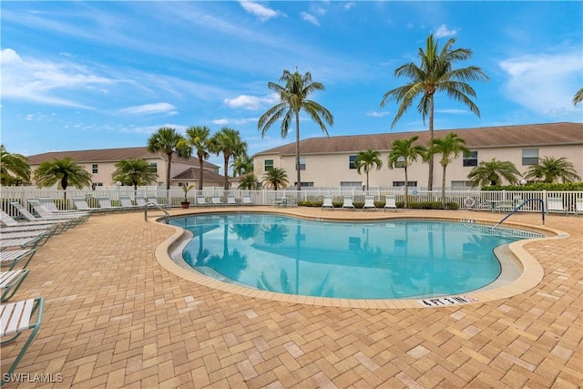 view of pool featuring a patio