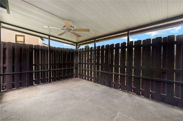 exterior space with ceiling fan