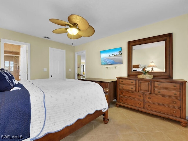 bedroom featuring ceiling fan and light tile patterned floors