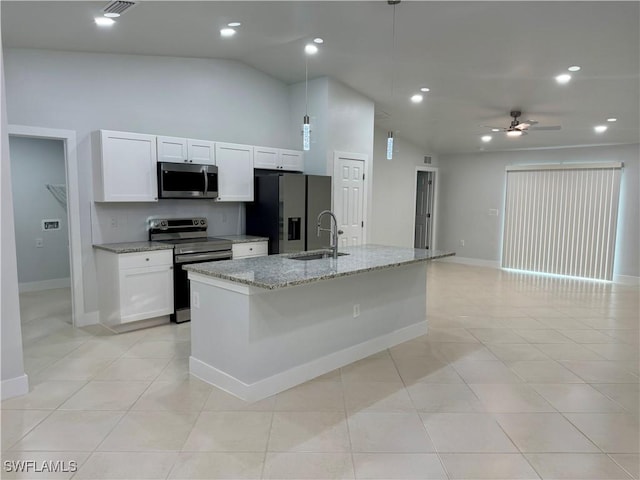 kitchen with white cabinetry, sink, an island with sink, stainless steel appliances, and light stone counters