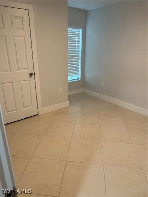 view of tiled spare room