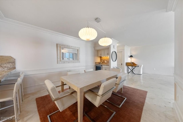 dining room with ornamental molding