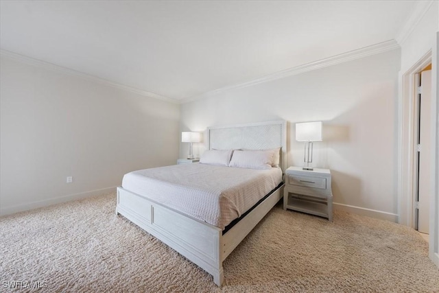 carpeted bedroom with ornamental molding